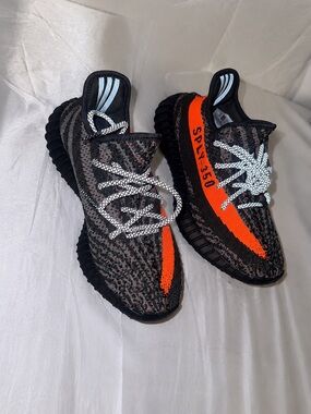 Yeezy Boost 350 V2 Black with Orange Stripe and Reflective Laces